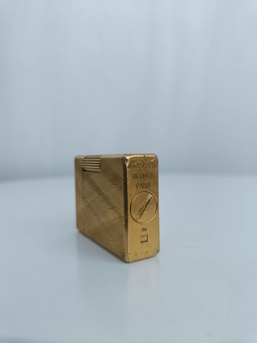 S.T. Dupont x Hermès Small Ligne 1 gold peacock feather