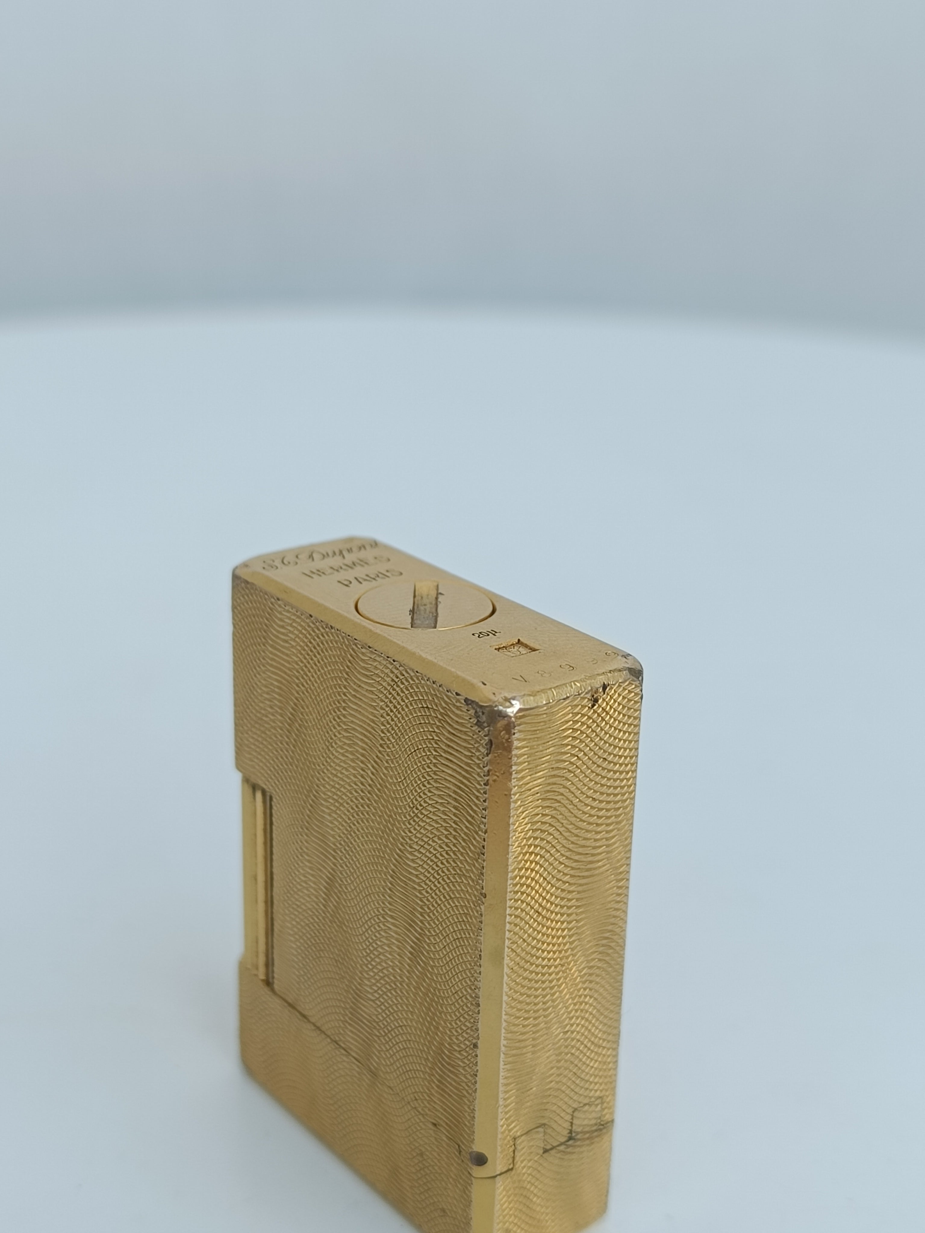 S.T. Dupont x Hermès Small Ligne 1 gold peacock feather