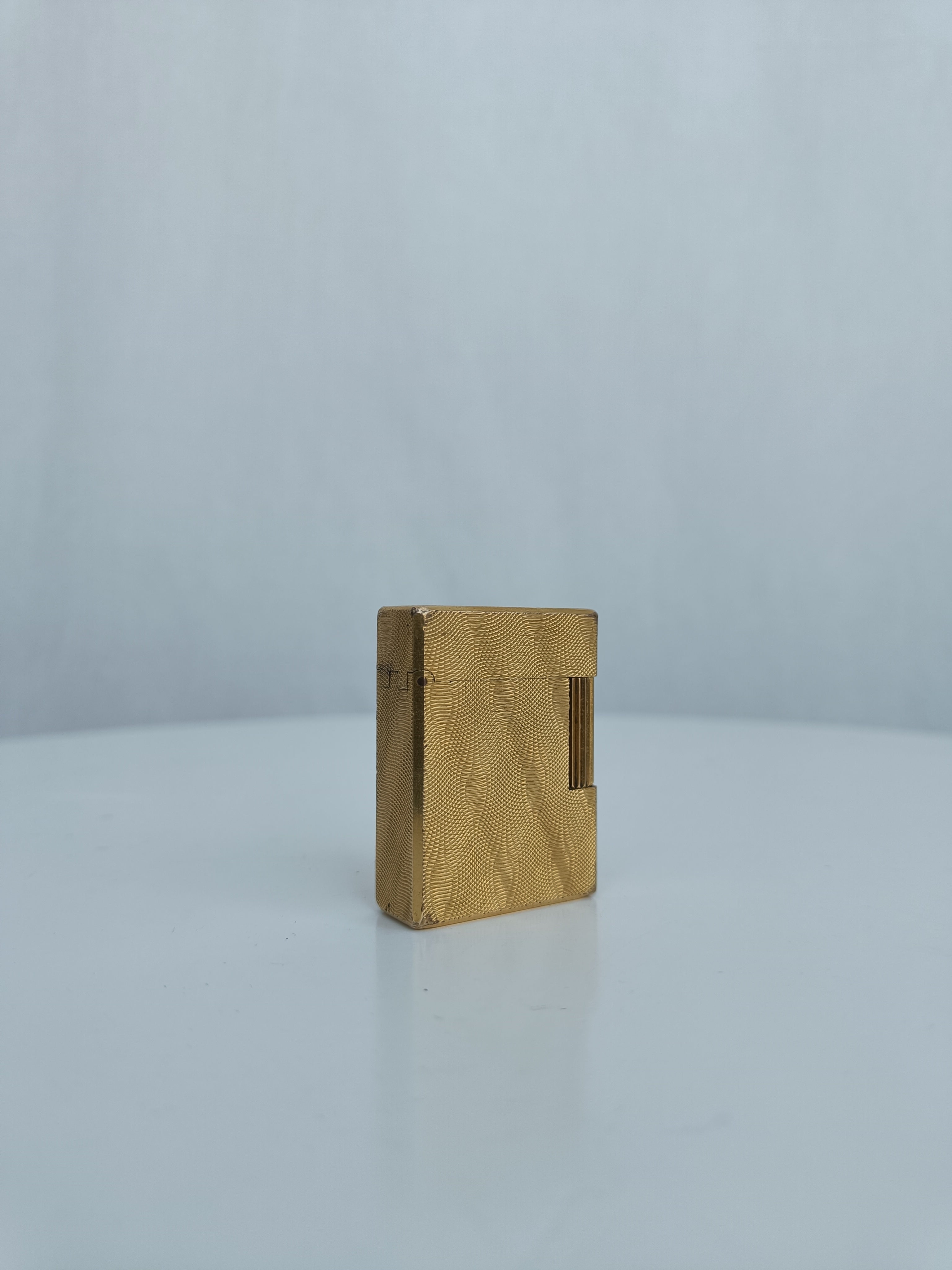 S.T. Dupont x Hermès Small Ligne 1 gold peacock feather