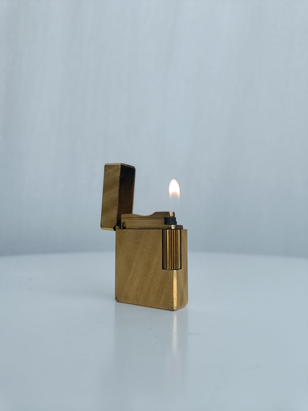 S.T. Dupont x Hermès Small Ligne 1 gold peacock feather