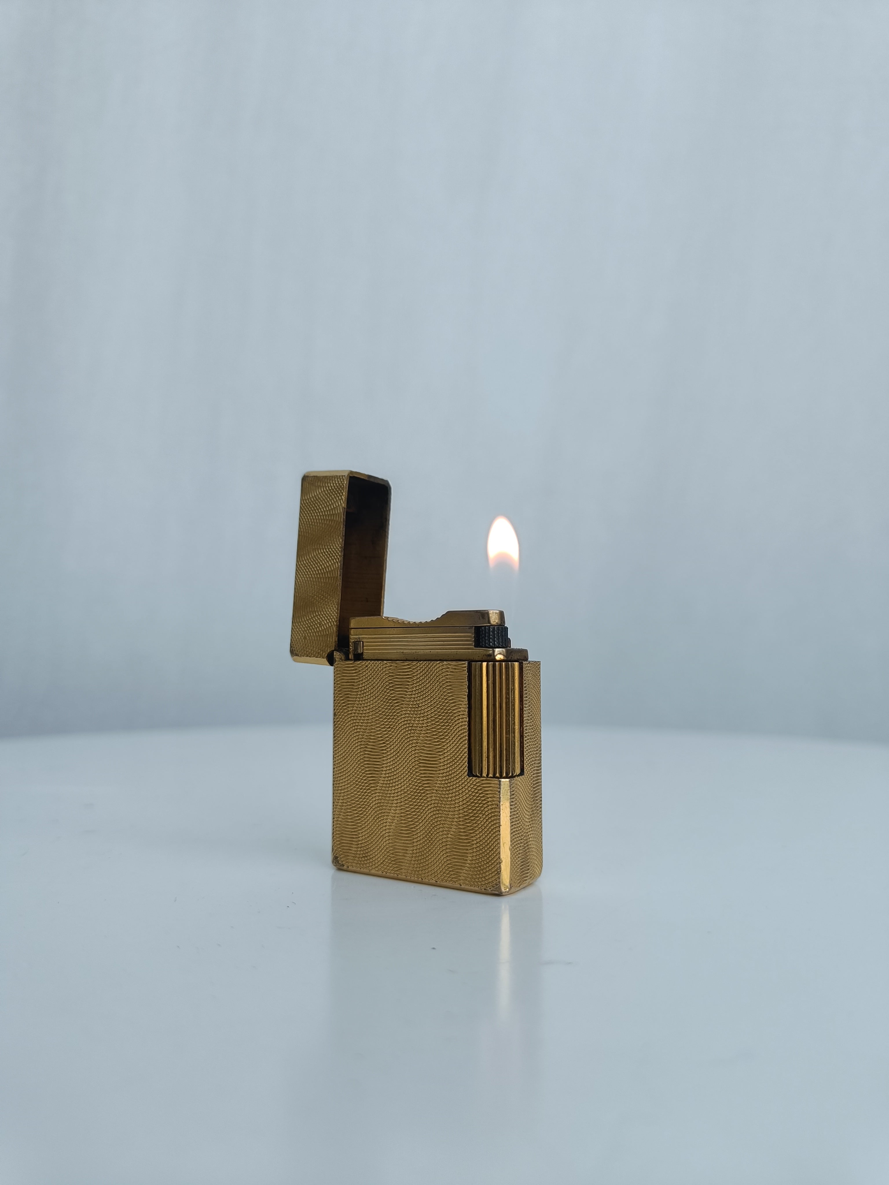 S.T. Dupont x Hermès Small Ligne 1 gold peacock feather