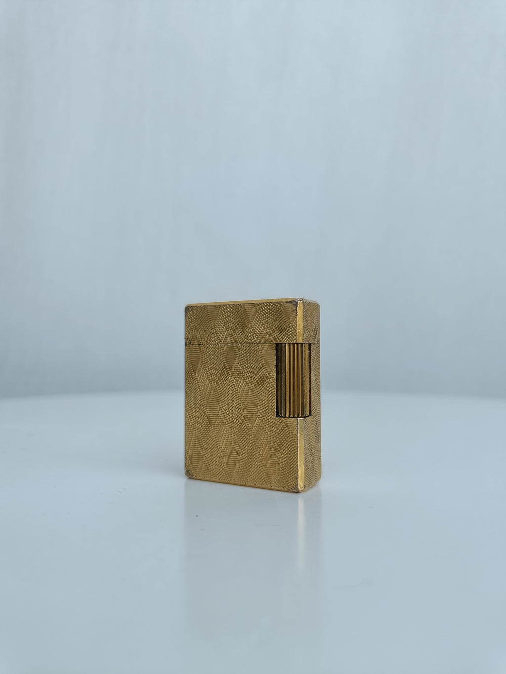 S.T. Dupont x Hermès Small Ligne 1 gold peacock feather