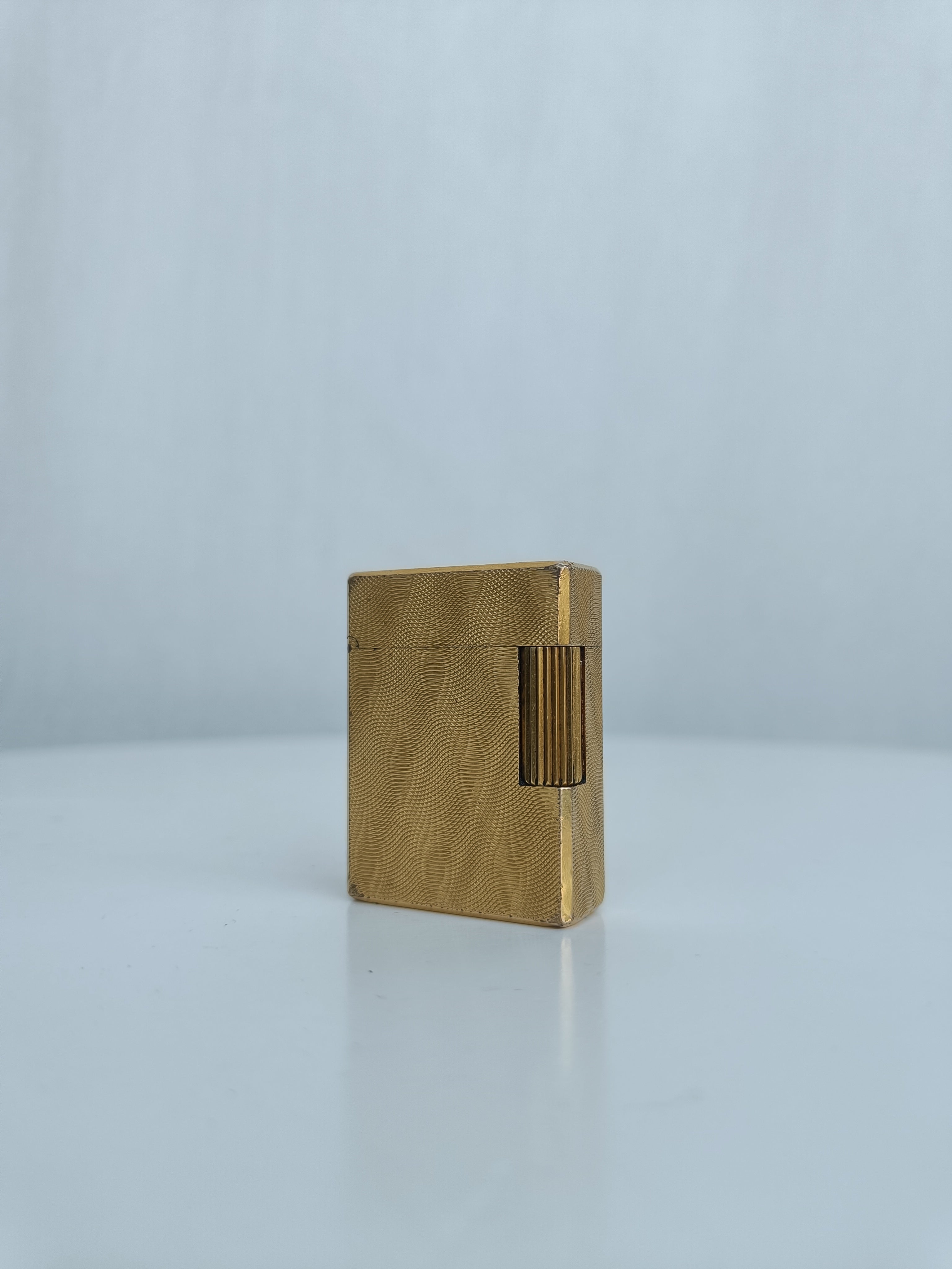 S.T. Dupont x Hermès Small Ligne 1 gold peacock feather