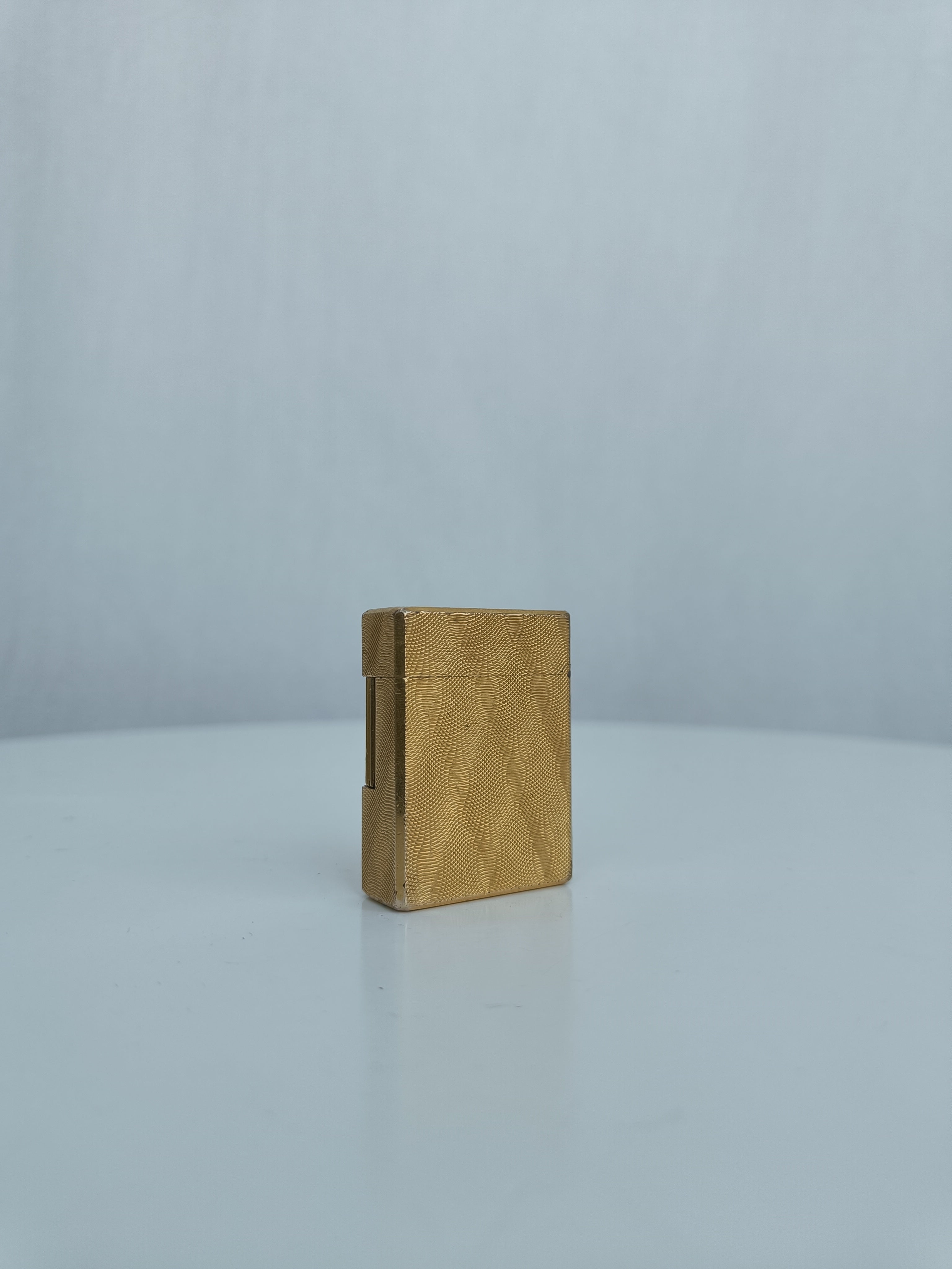 S.T. Dupont x Hermès Small Ligne 1 gold peacock feather