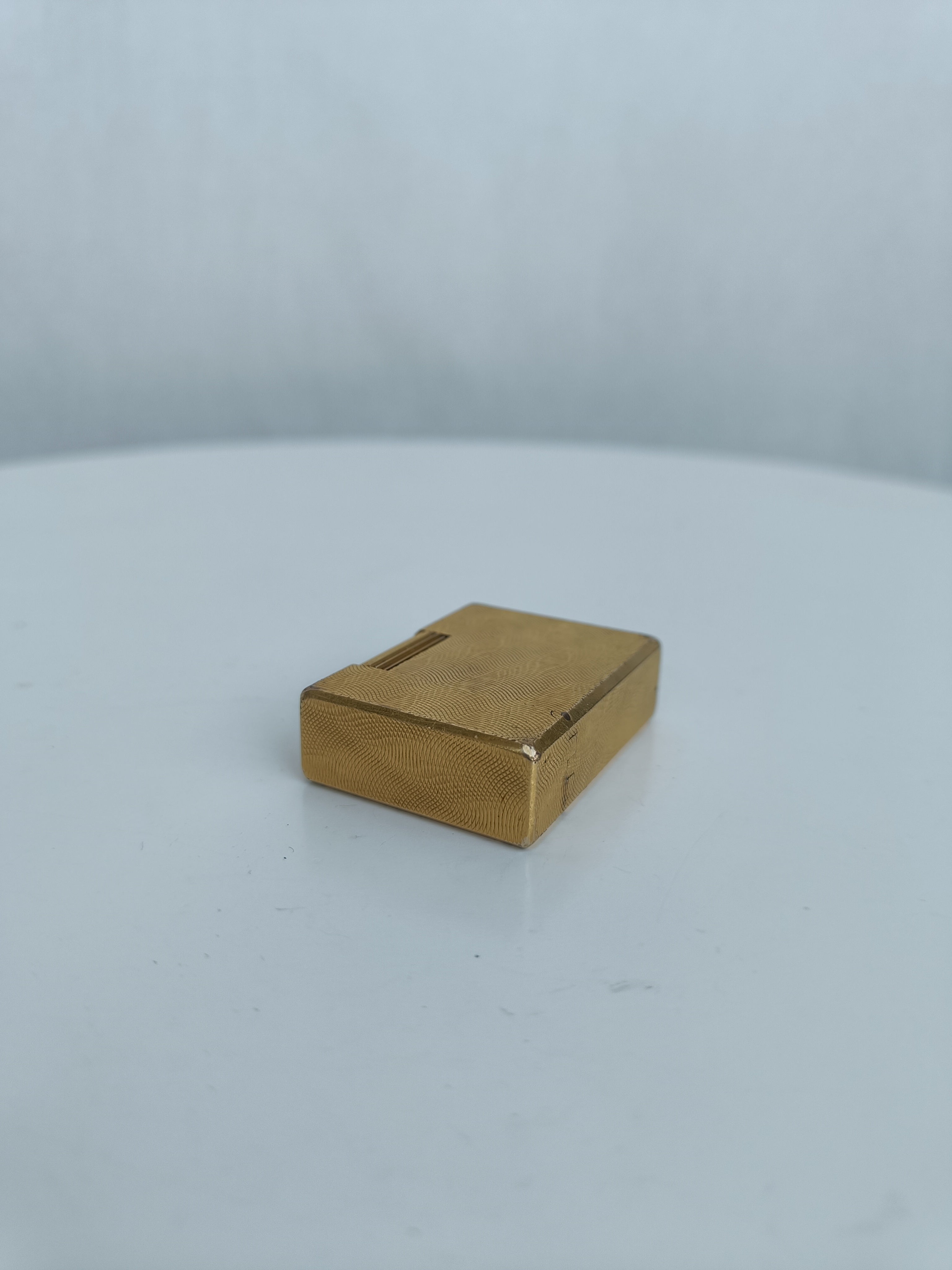 S.T. Dupont x Hermès Small Ligne 1 gold peacock feather