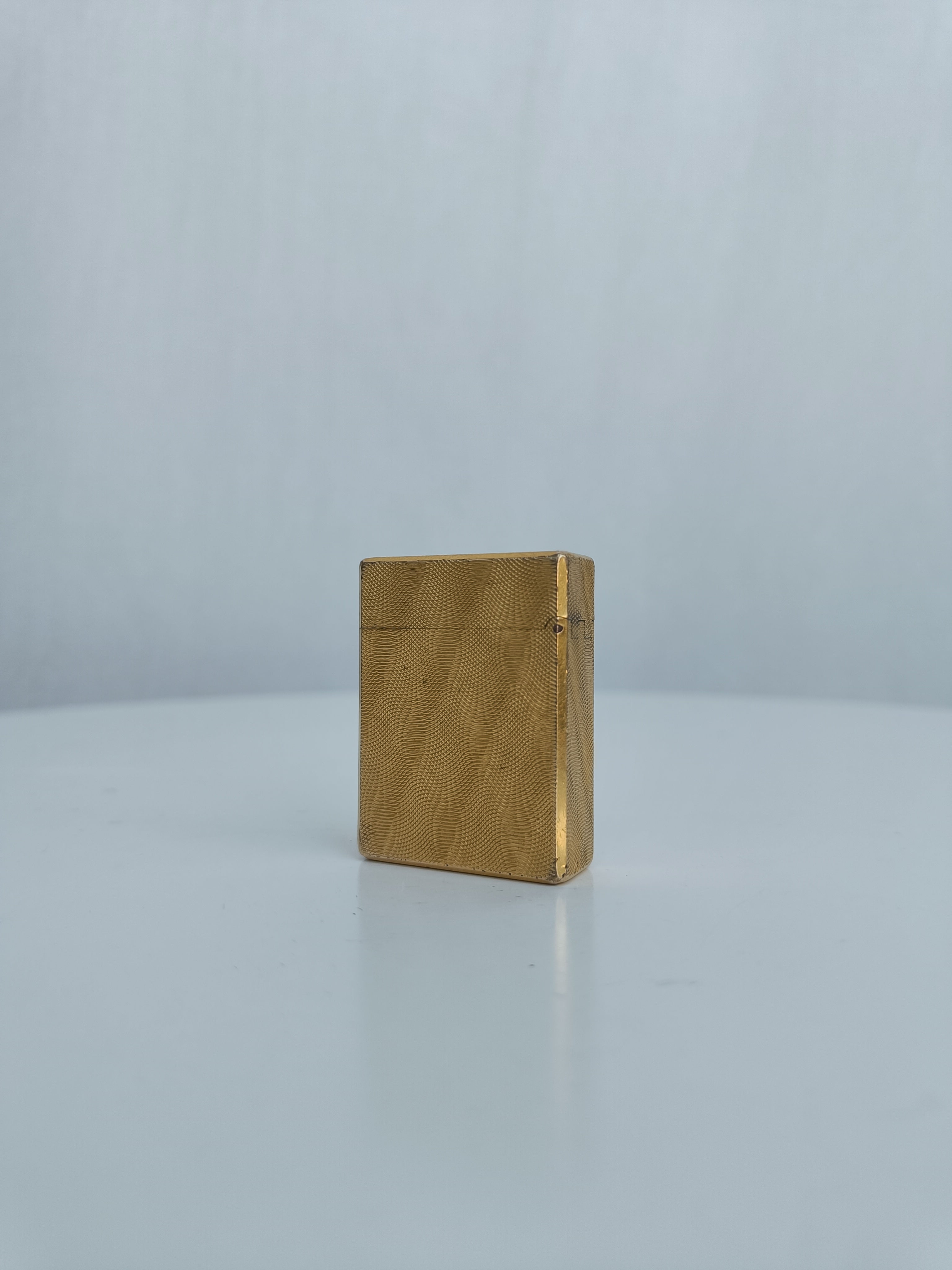 S.T. Dupont x Hermès Small Ligne 1 gold peacock feather