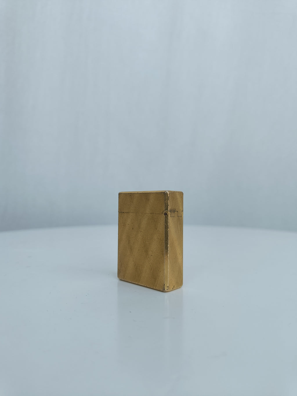 S.T. Dupont x Hermès Small Ligne 1 gold peacock feather