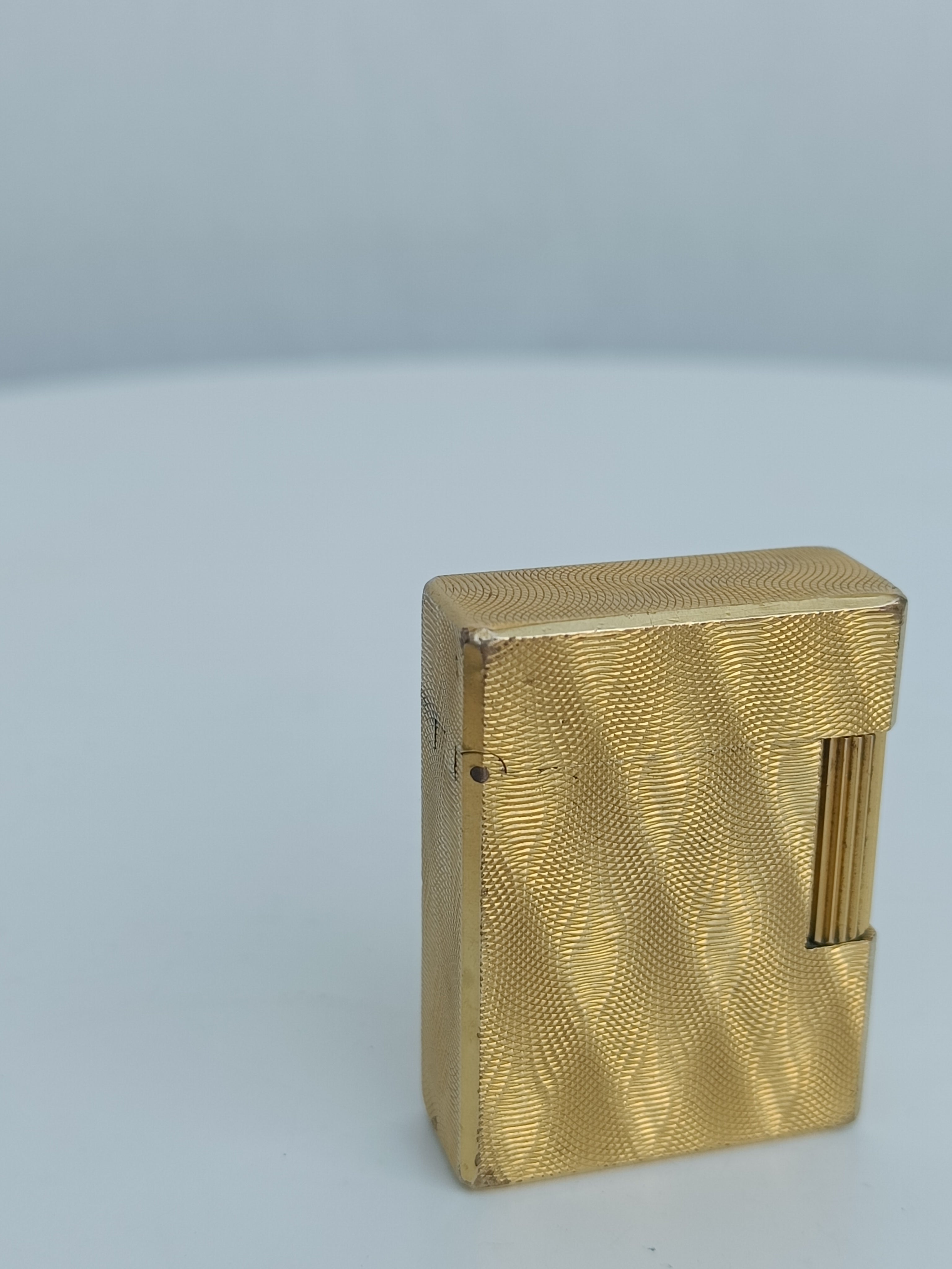 S.T. Dupont x Hermès Small Ligne 1 gold peacock feather