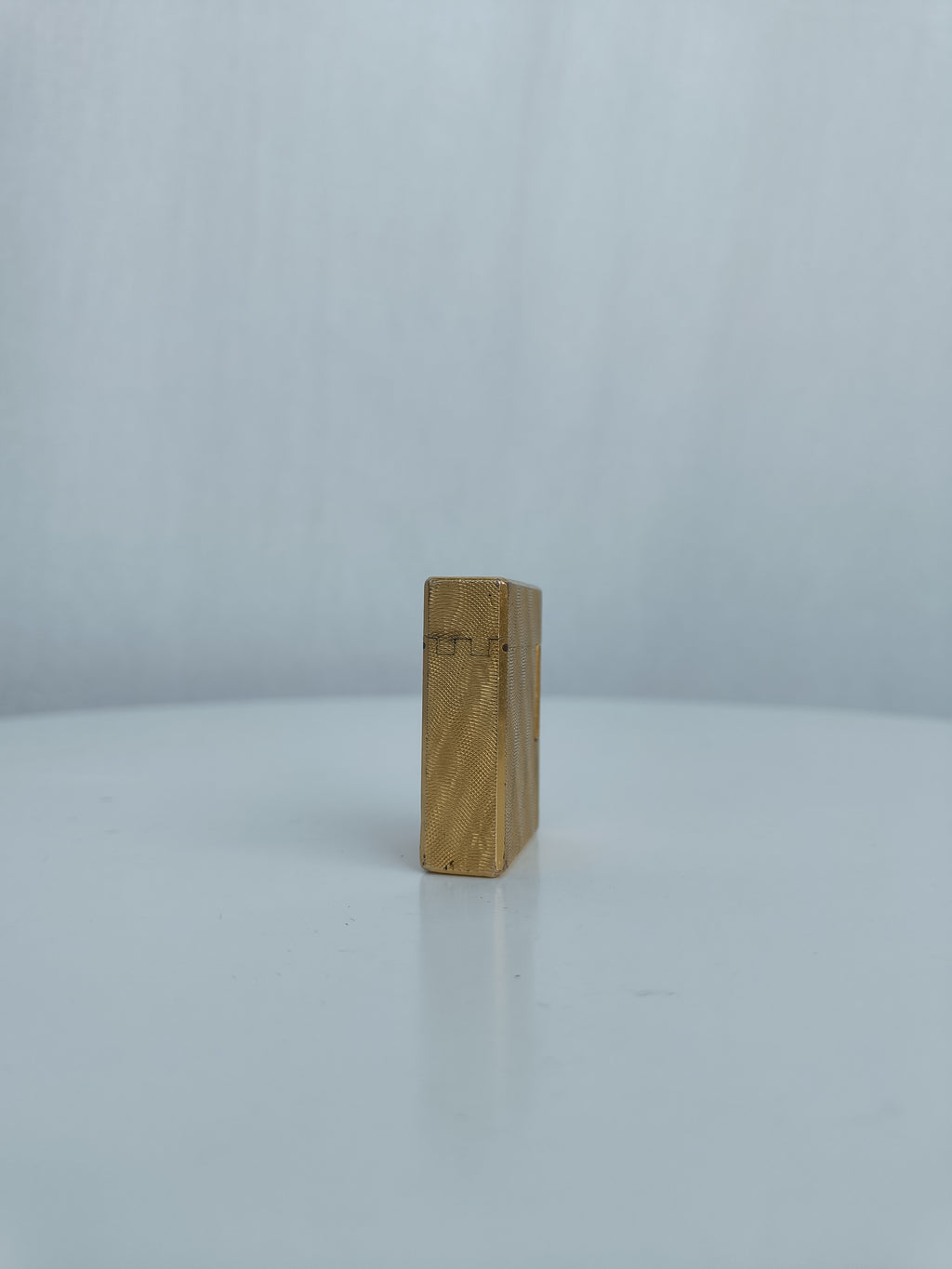 S.T. Dupont x Hermès Small Ligne 1 gold peacock feather