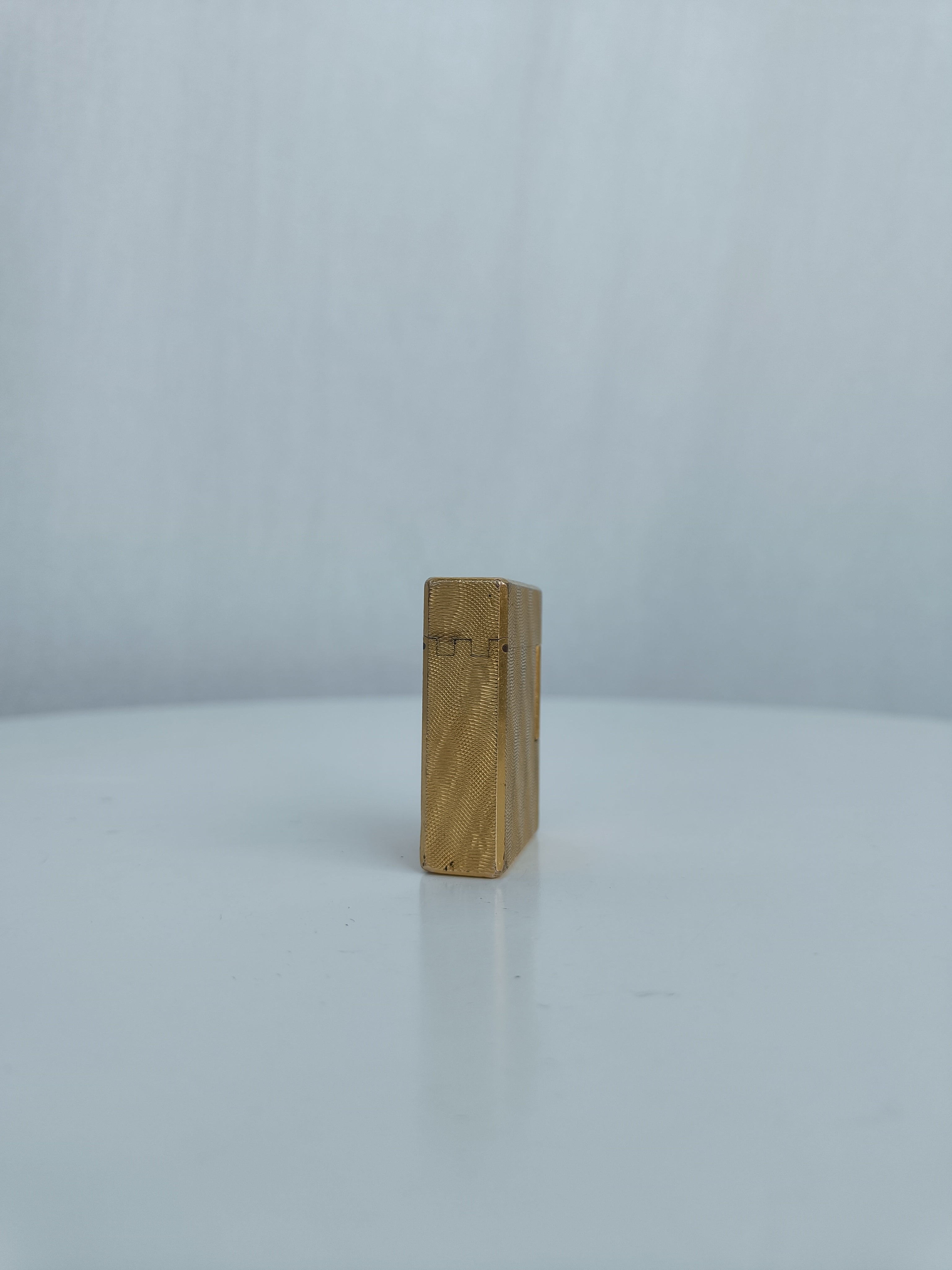 S.T. Dupont x Hermès Small Ligne 1 gold peacock feather