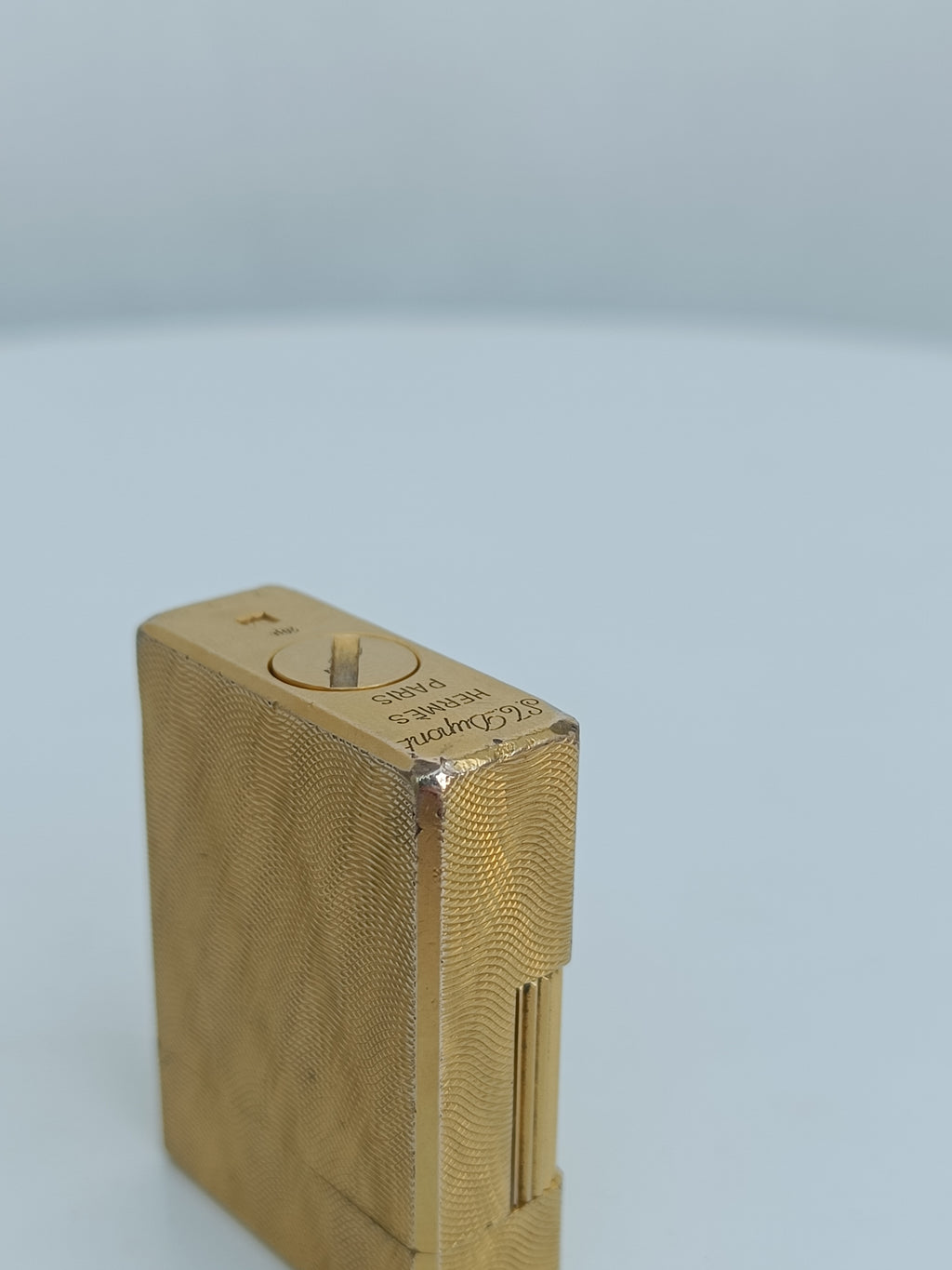 S.T. Dupont x Hermès Small Ligne 1 gold peacock feather