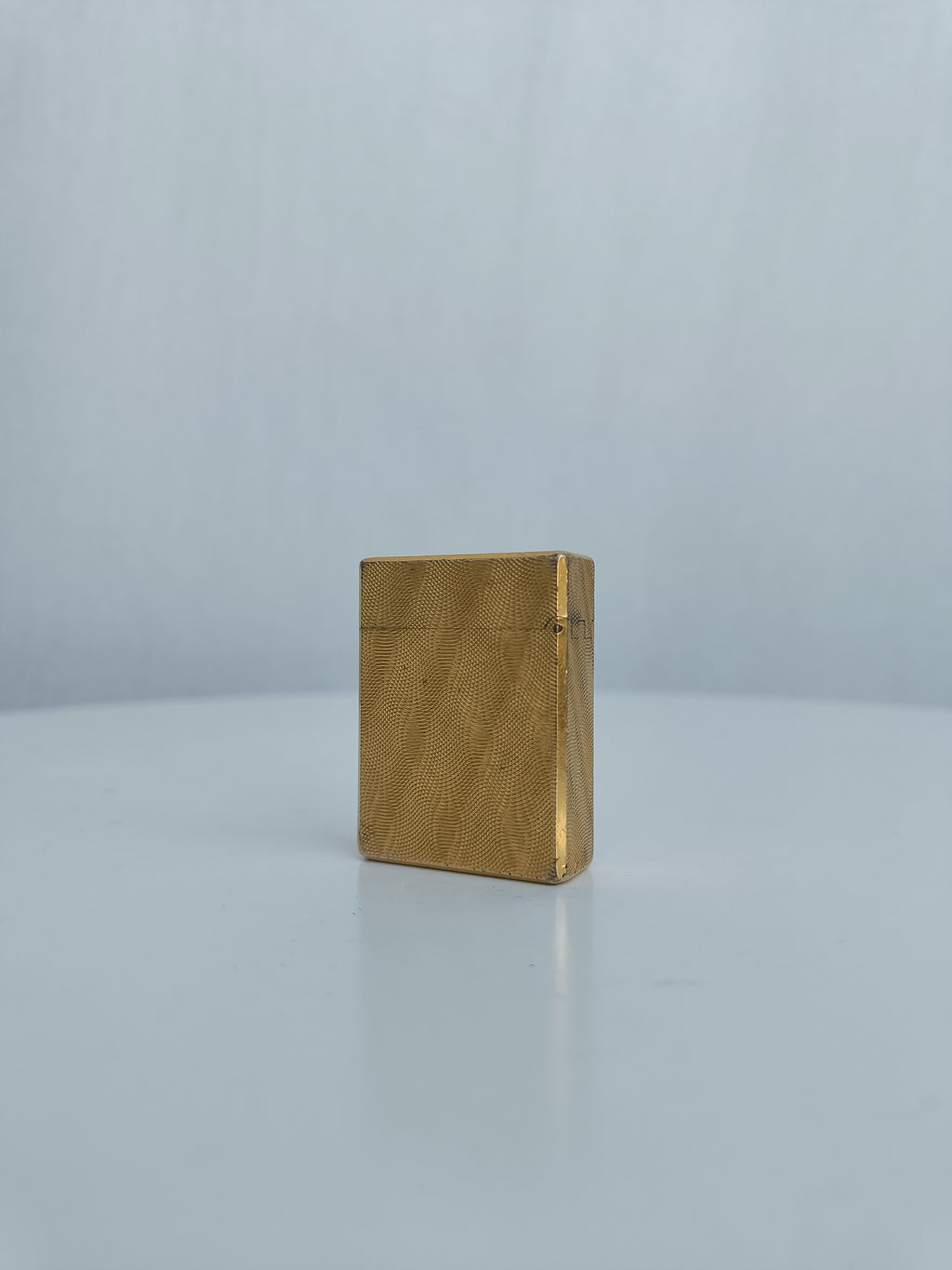S.T. Dupont x Hermès Small Ligne 1 gold peacock feather
