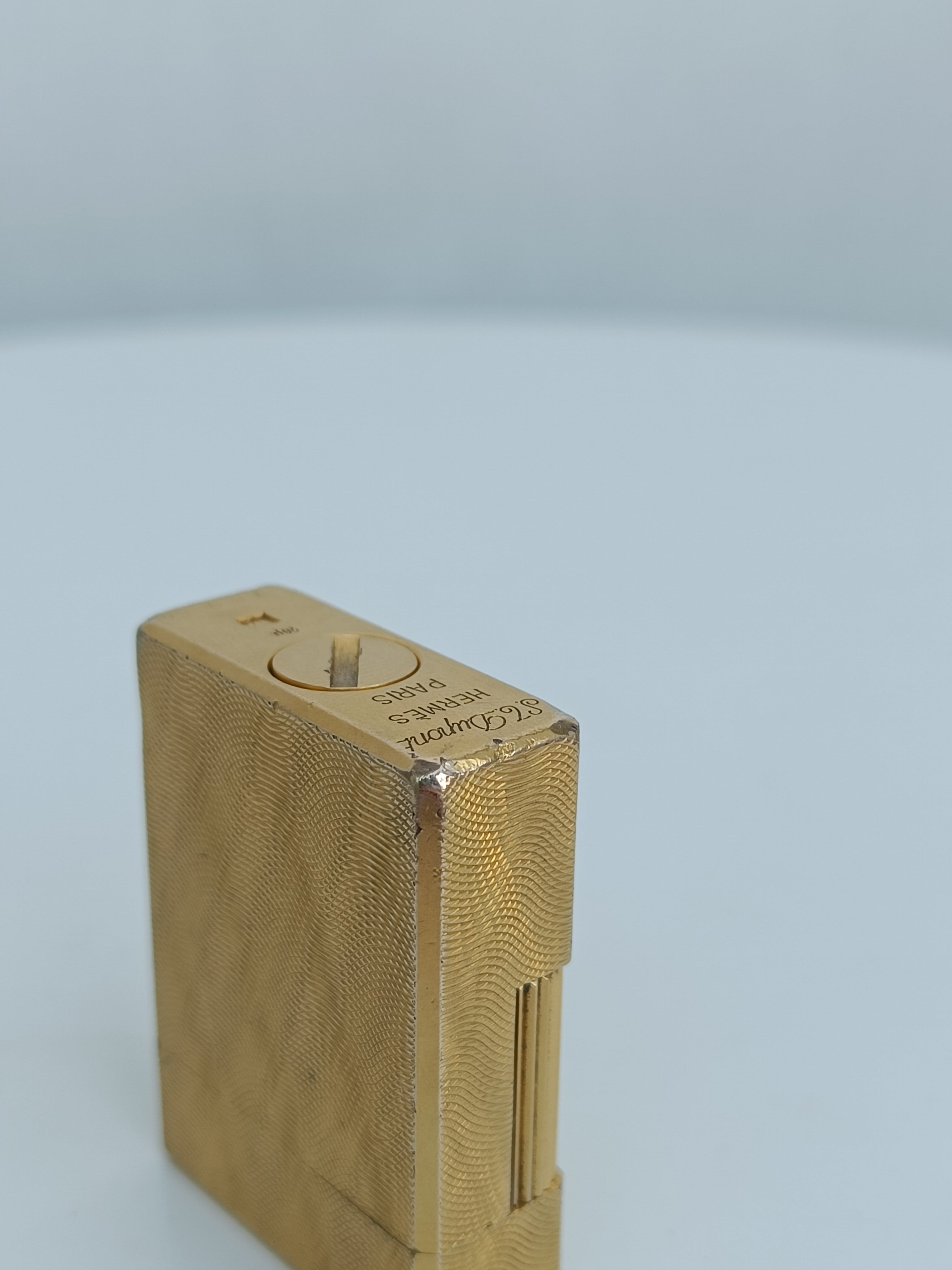 S.T. Dupont x Hermès Small Ligne 1 gold peacock feather