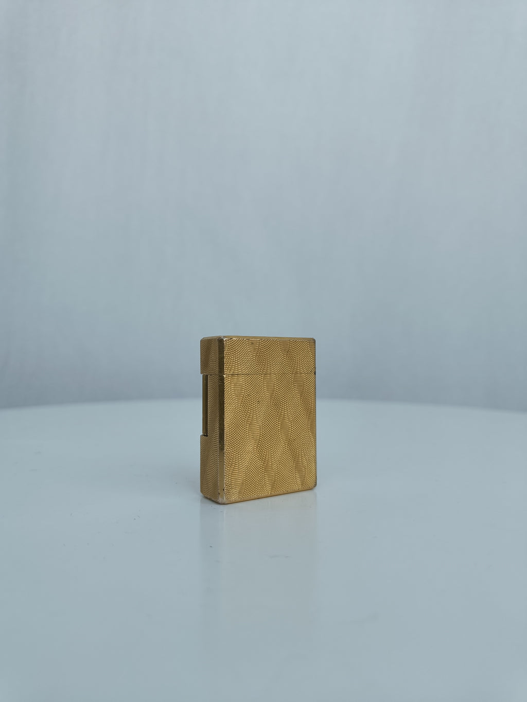 S.T. Dupont x Hermès Small Ligne 1 gold peacock feather