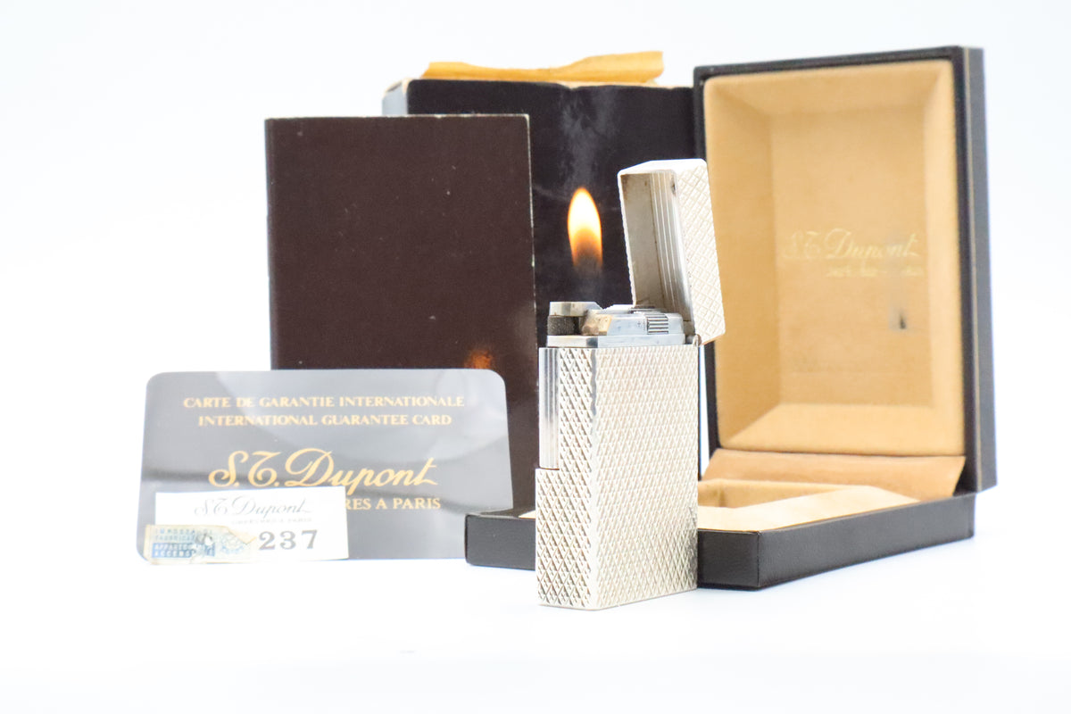 S.T. Dupont Ligne 1 large silver Etoile lighter, new old stock, with box and papers
