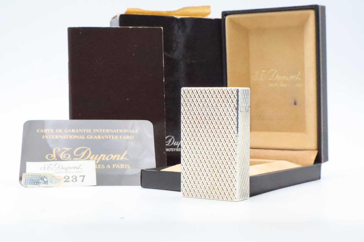 S.T. Dupont Ligne 1 large silver Etoile lighter, new old stock, with box and papers