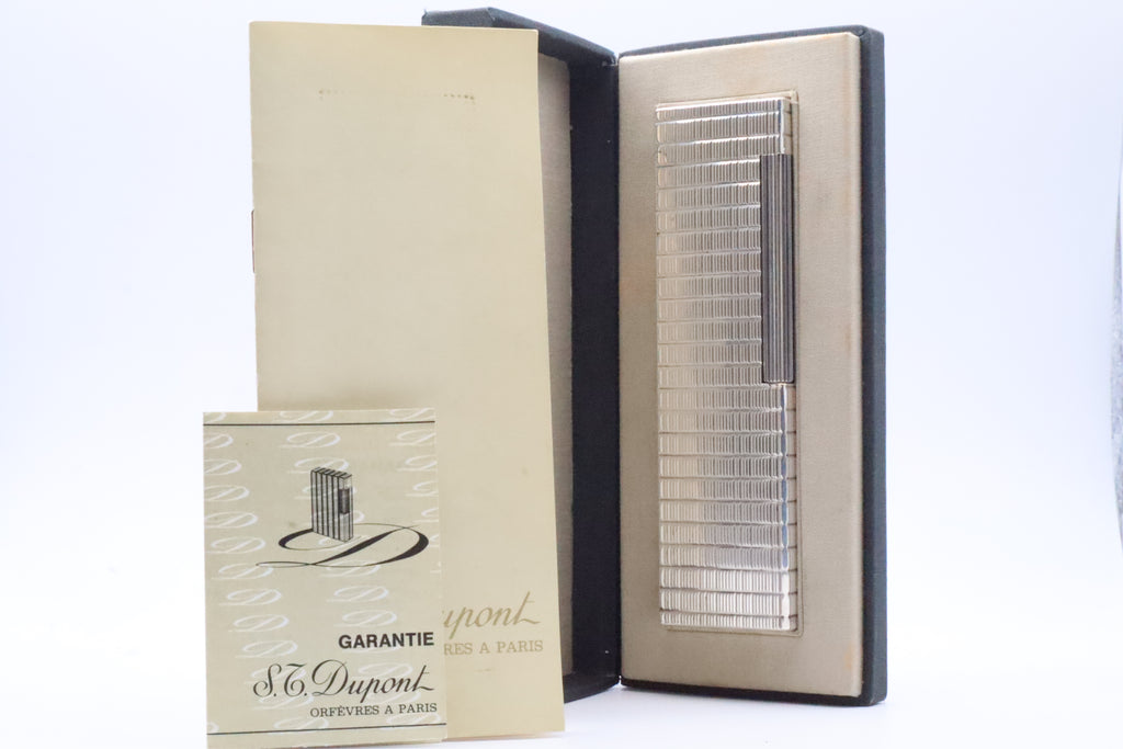 S.T. Dupont Ligne 1 silver table lighter with Prince of Wales pattern, with original box and papers