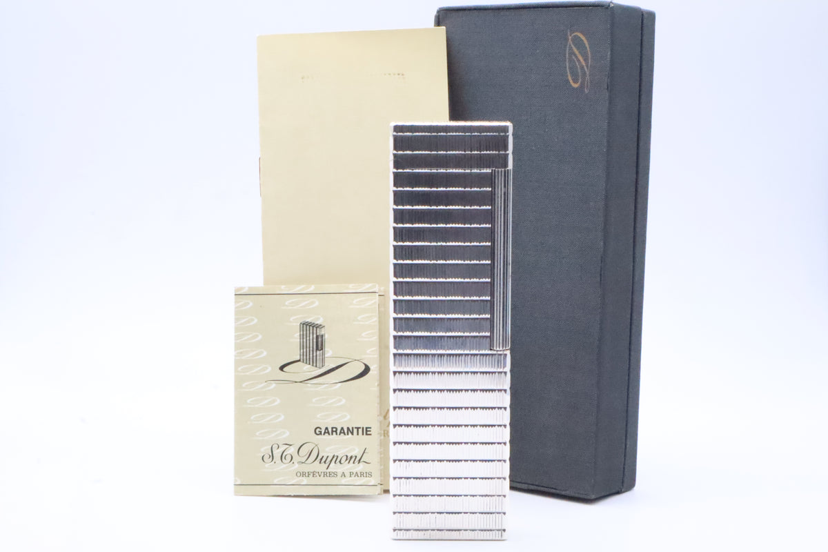 S.T. Dupont Ligne 1 silver table lighter with Prince of Wales pattern, with original box and papers