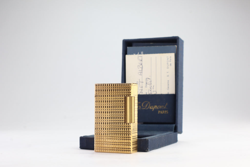 S.T. Dupont Ligne 1 BR large gold lighter with a squared quadrillage pattern, with its navy box and guarantee card