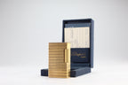 S.T. Dupont Ligne 1 BR large gold lighter with a squared quadrillage pattern, with its navy box and guarantee card