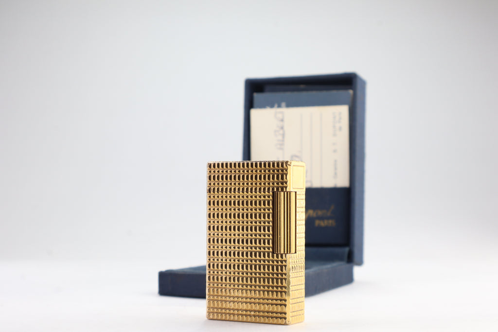 S.T. Dupont Ligne 1 BR large gold lighter with a squared quadrillage pattern, with its navy box and guarantee card