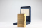 S.T. Dupont Ligne 1 BR large gold lighter with a squared quadrillage pattern, with its navy box and guarantee card