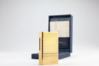 S.T. Dupont Ligne 1 BR large gold lighter with a squared quadrillage pattern, with its navy box and guarantee card