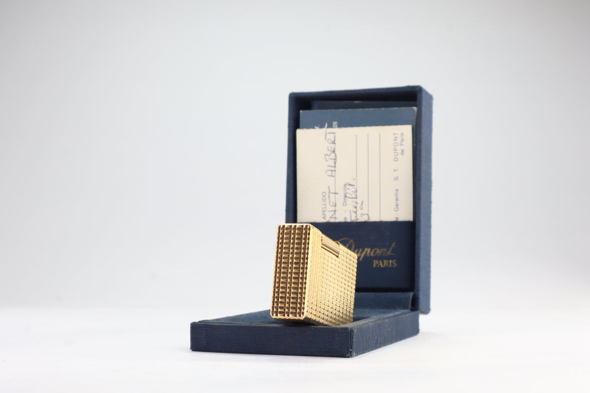S.T. Dupont Ligne 1 BR large gold lighter with a squared quadrillage pattern, with its navy box and guarantee card