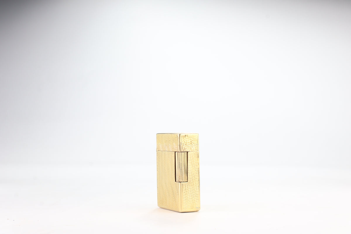 Solid 18k gold S.T. Dupont Ligne 1 BS small lighter with a fine wave engine-turned pattern