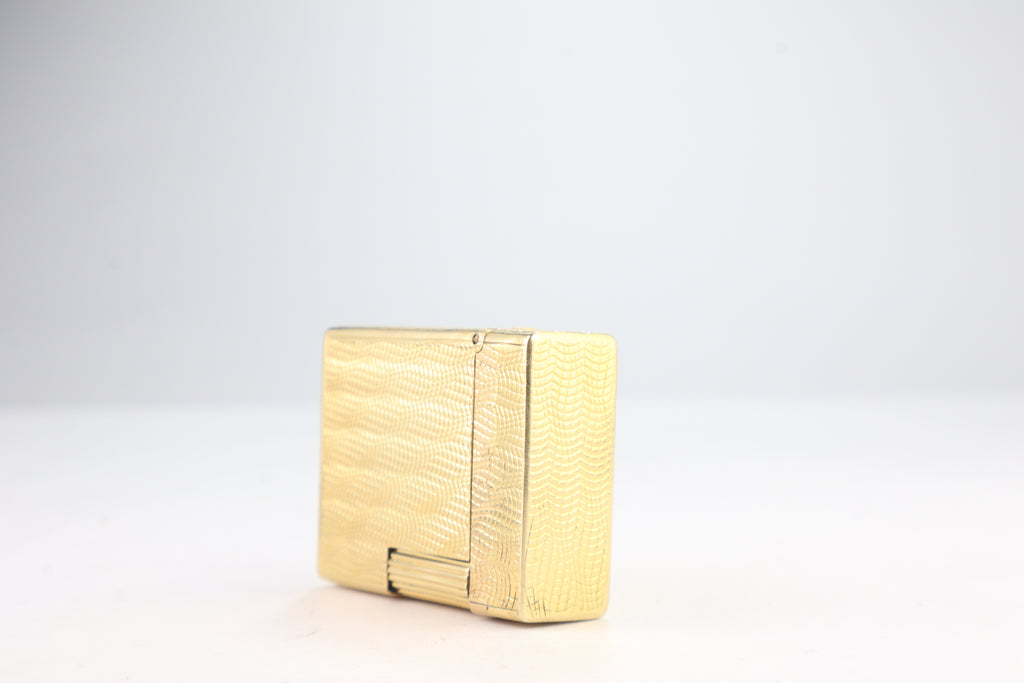 Solid 18k gold S.T. Dupont Ligne 1 BS small lighter with a fine wave engine-turned pattern