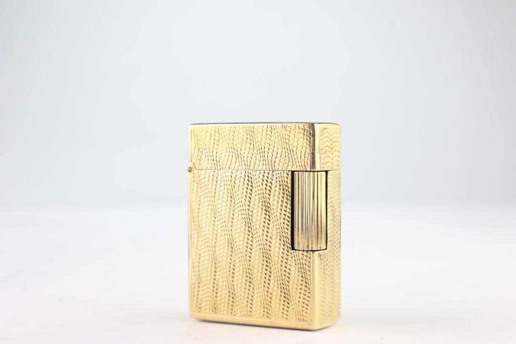 Solid 18k gold S.T. Dupont Ligne 1 BS small lighter with a fine wave engine-turned pattern