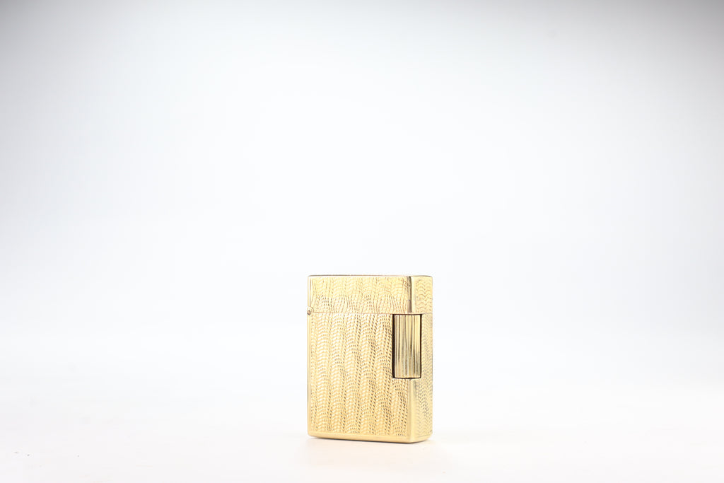 Solid 18k gold S.T. Dupont Ligne 1 BS small lighter with a fine wave engine-turned pattern