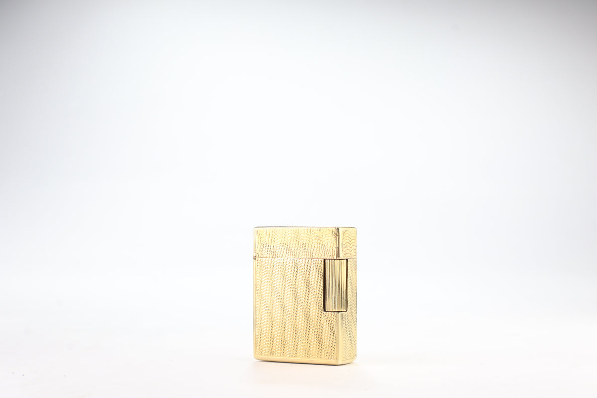 Solid 18k gold S.T. Dupont Ligne 1 BS small lighter with a fine wave engine-turned pattern