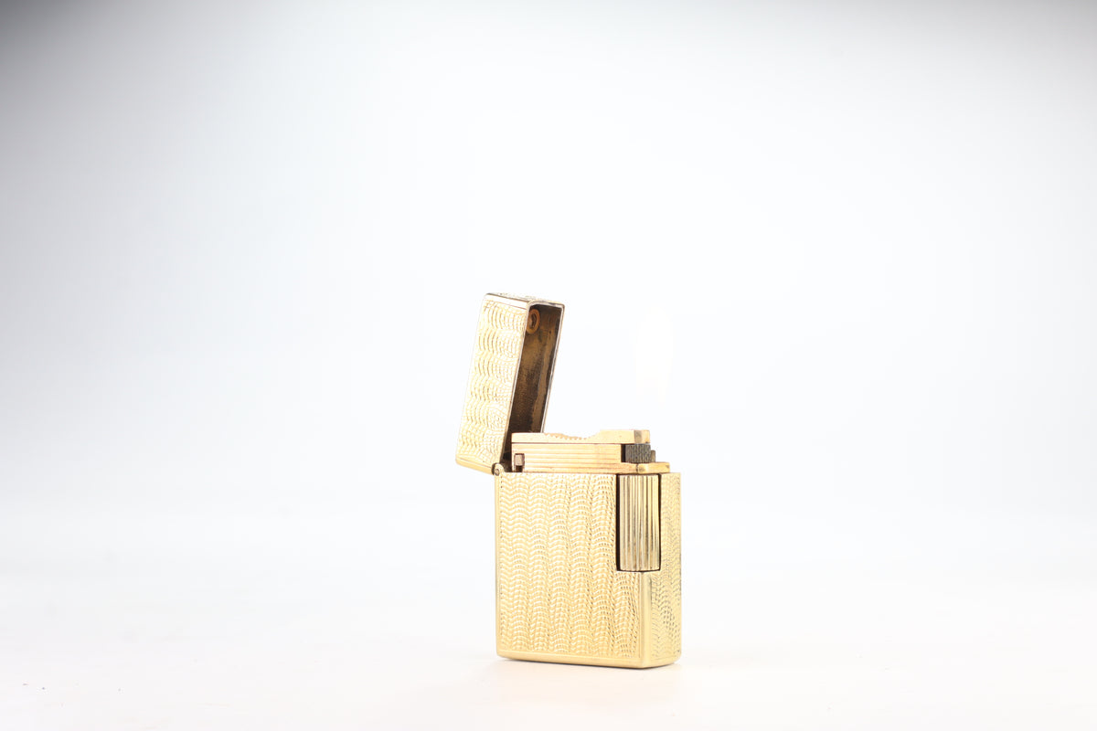 Solid 18k gold S.T. Dupont Ligne 1 BS small lighter with a fine wave engine-turned pattern