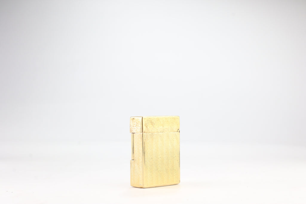Solid 18k gold S.T. Dupont Ligne 1 BS small lighter with a fine wave engine-turned pattern