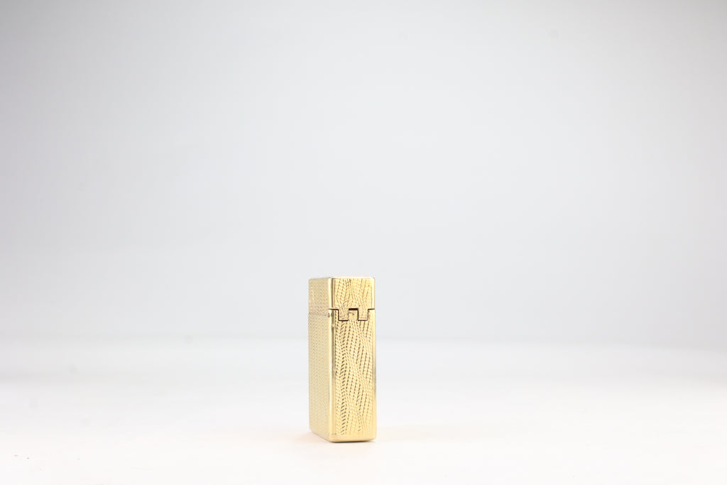 Solid 18k gold S.T. Dupont Ligne 1 BS small lighter with a fine wave engine-turned pattern