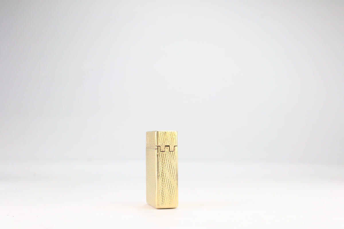 Solid 18k gold S.T. Dupont Ligne 1 BS small lighter with a fine wave engine-turned pattern