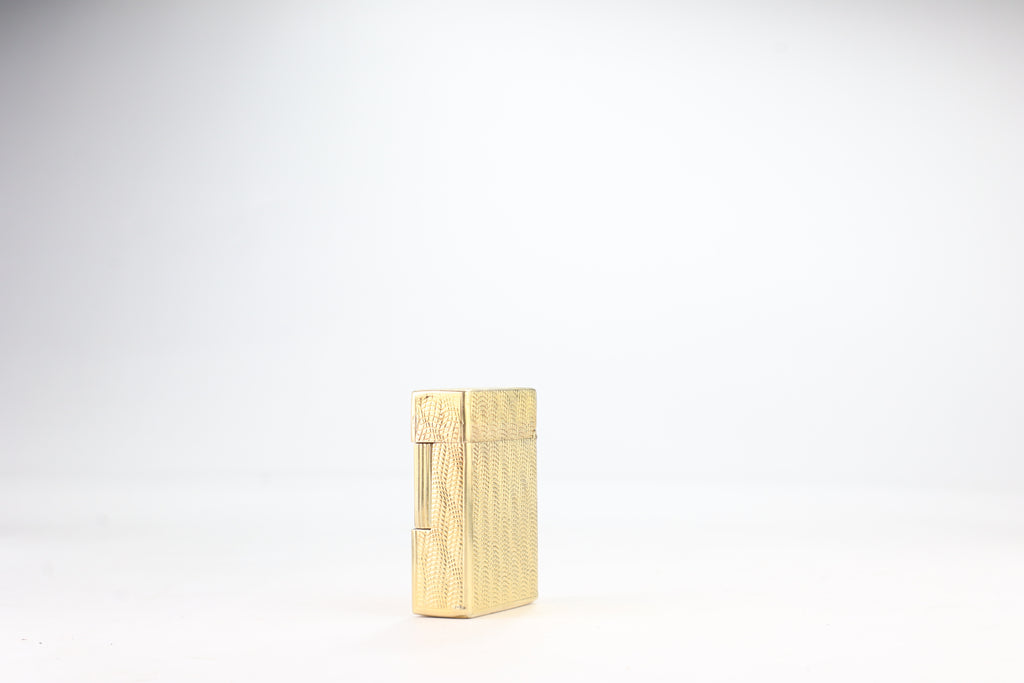 Solid 18k gold S.T. Dupont Ligne 1 BS small lighter with a fine wave engine-turned pattern