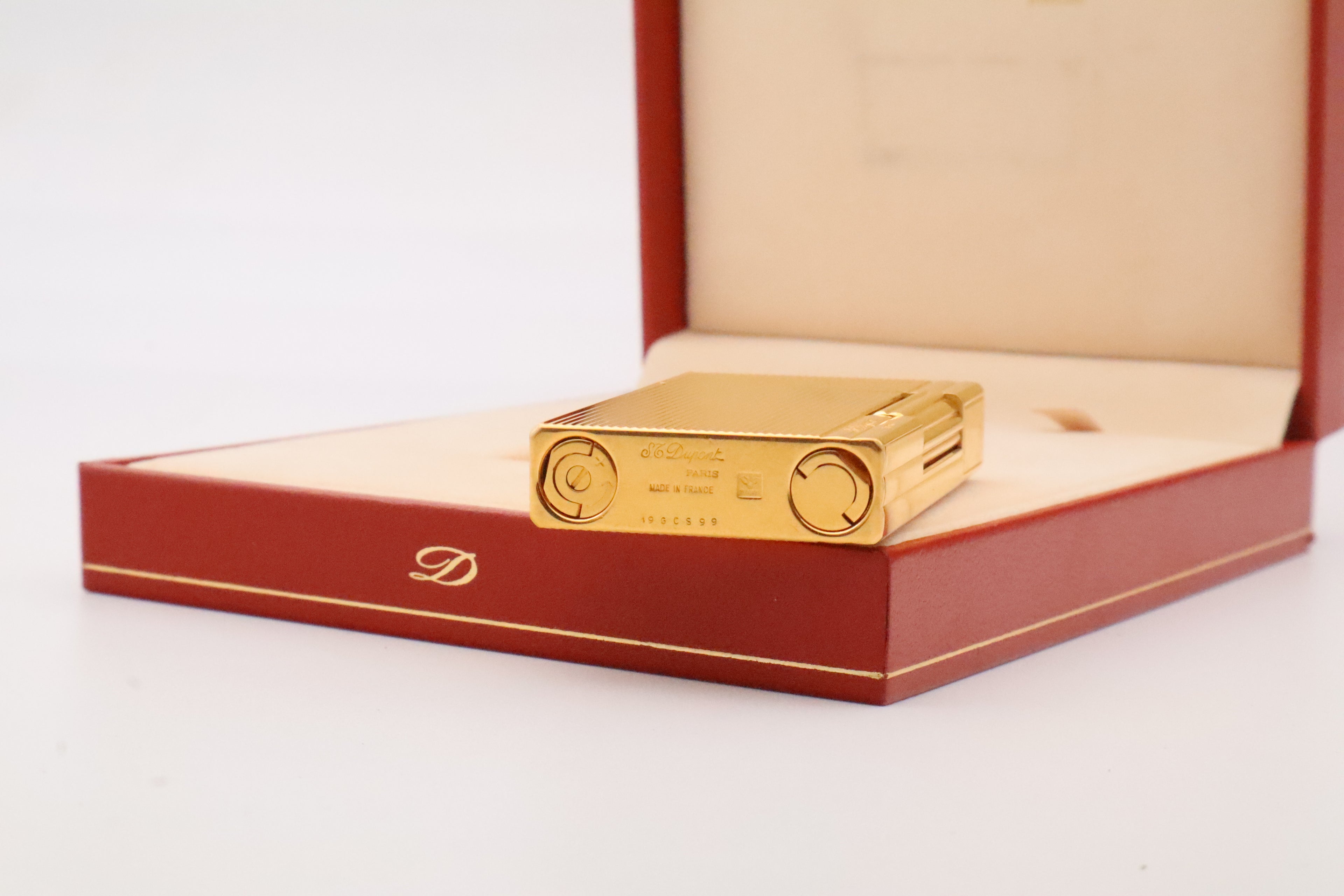 S.T. Dupont Gatsby gold lighter, new old stock condition, with original box
