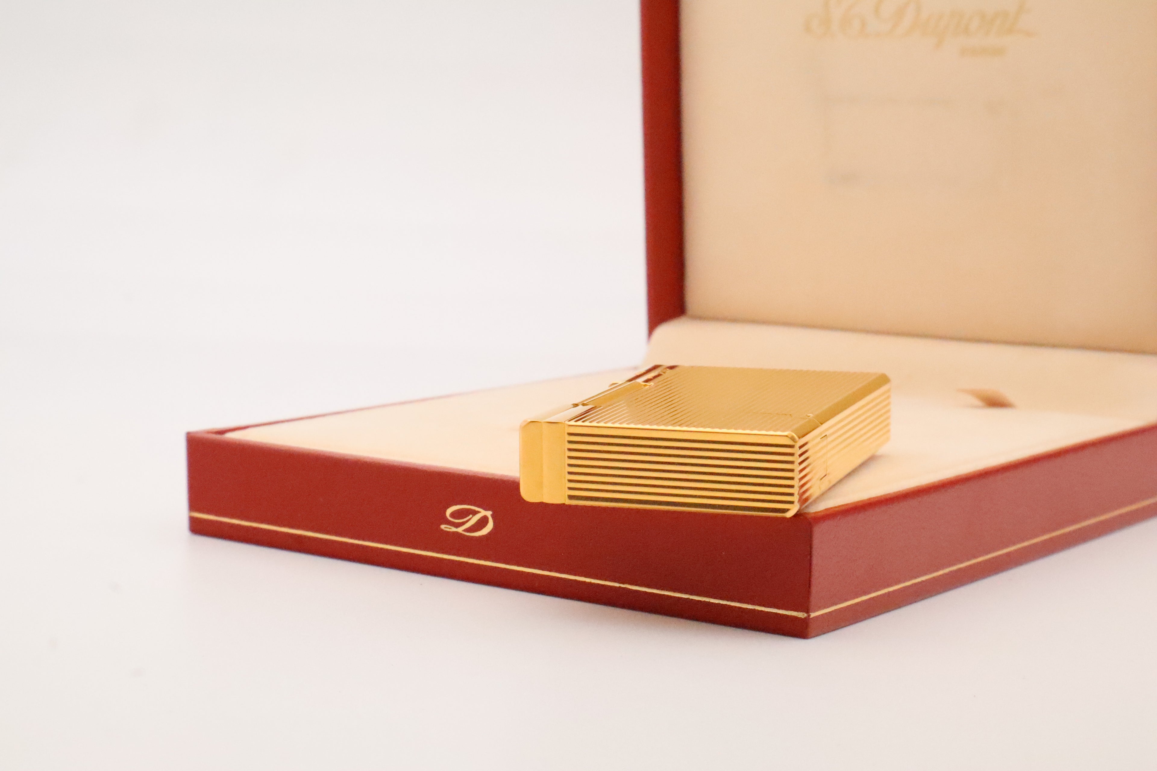 S.T. Dupont Gatsby gold lighter, new old stock condition, with original box