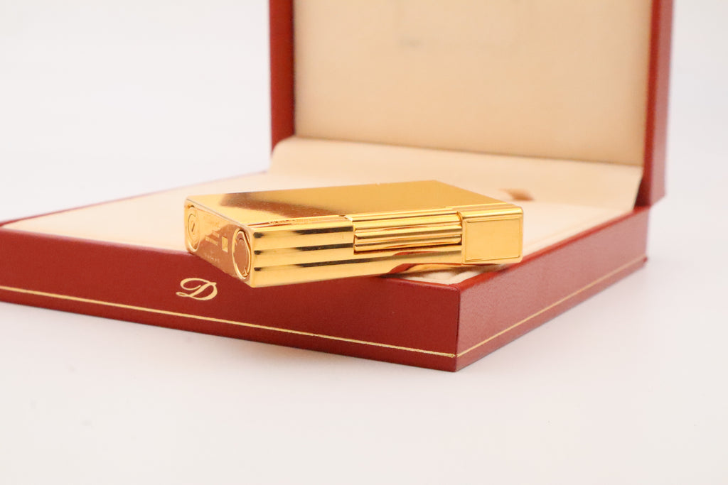 S.T. Dupont Gatsby gold lighter, new old stock condition, with original box