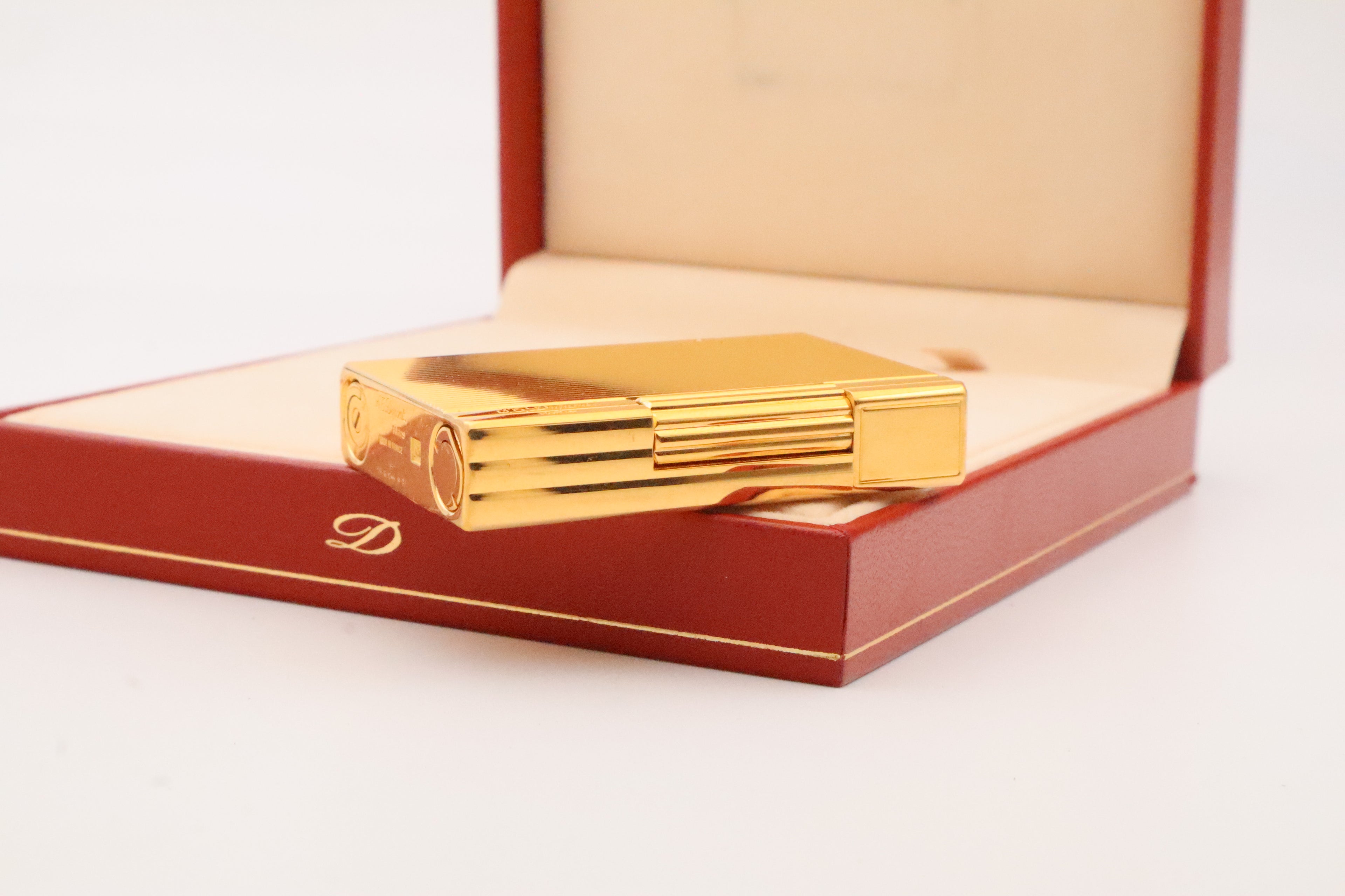 S.T. Dupont Gatsby gold lighter, new old stock condition, with original box