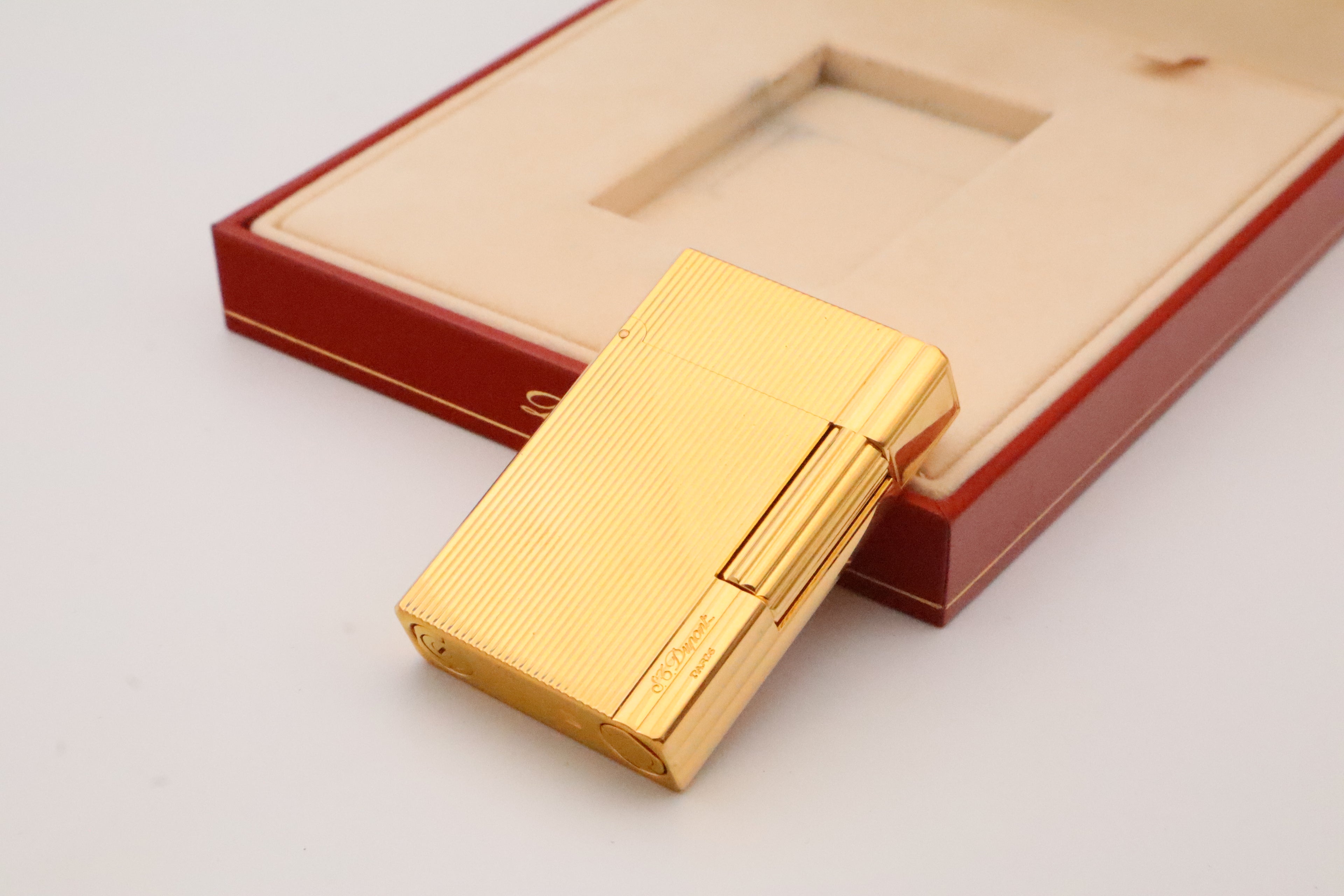 S.T. Dupont Gatsby gold lighter, new old stock condition, with original box