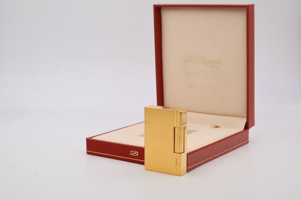 S.T. Dupont Gatsby gold lighter, new old stock condition, with original box