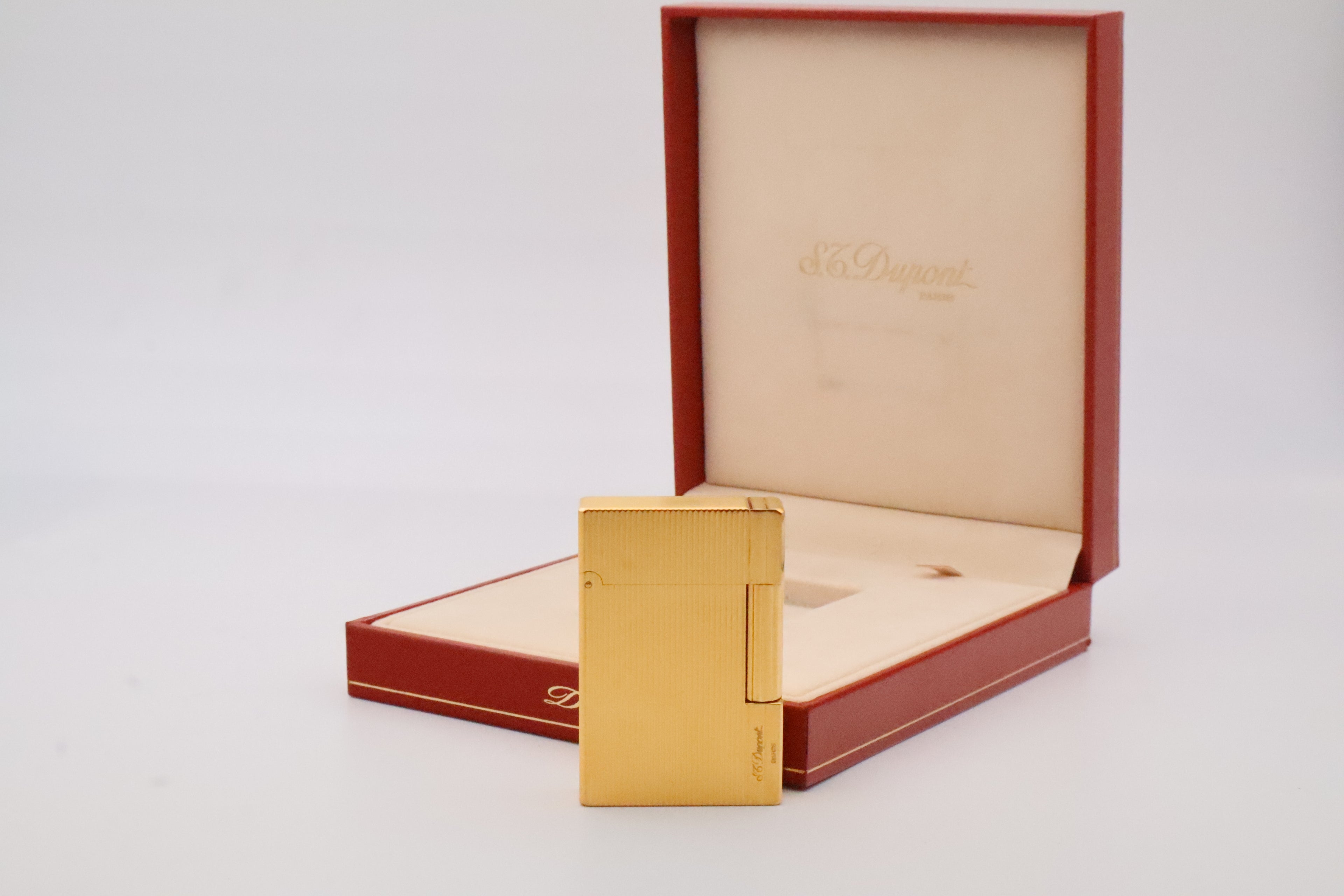 S.T. Dupont Gatsby gold lighter, new old stock condition, with original box
