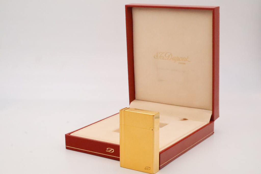 S.T. Dupont Gatsby gold lighter, new old stock condition, with original box