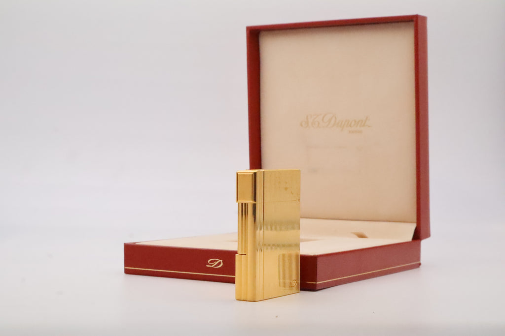 S.T. Dupont Gatsby gold lighter, new old stock condition, with original box