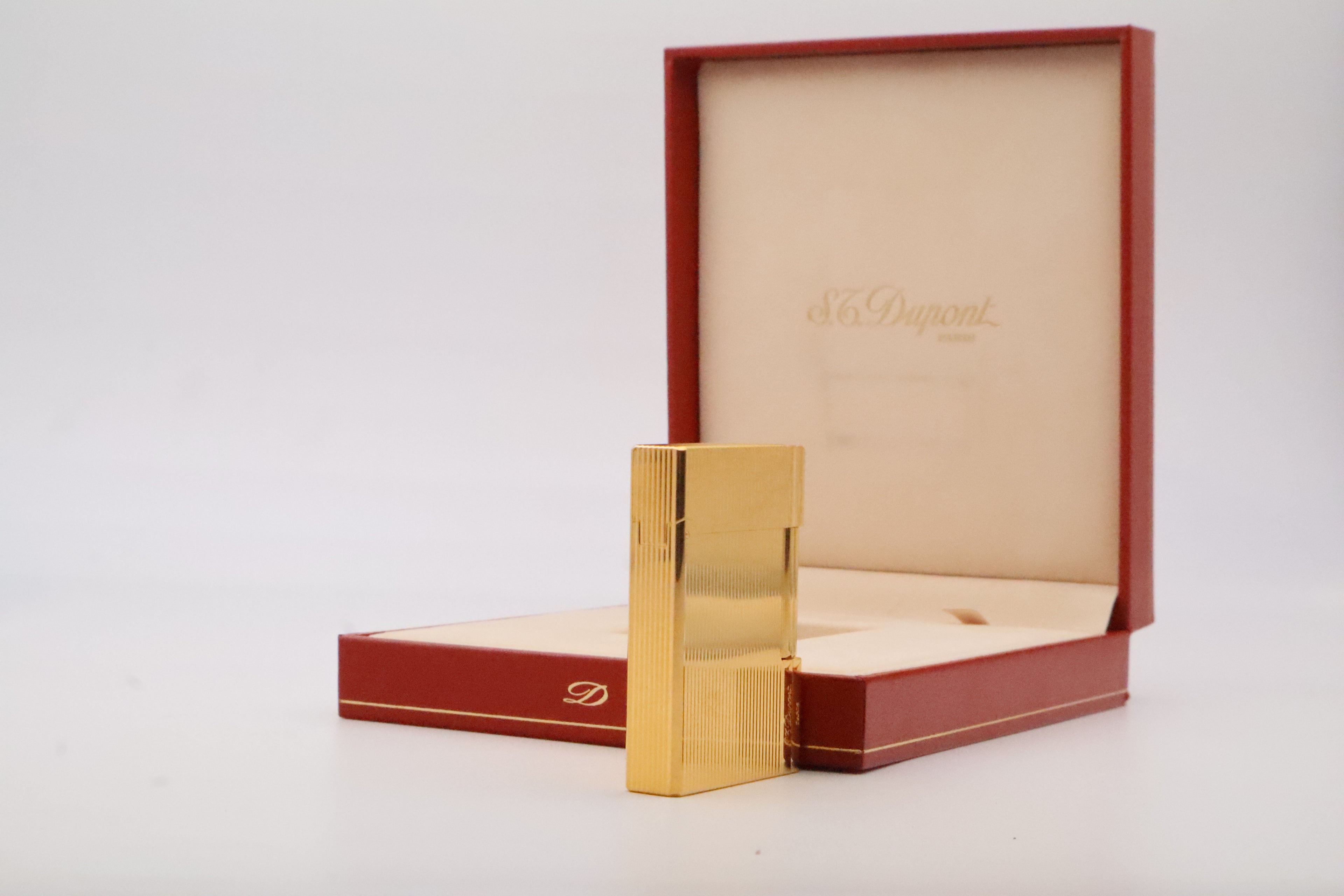 S.T. Dupont Gatsby gold lighter, new old stock condition, with original box