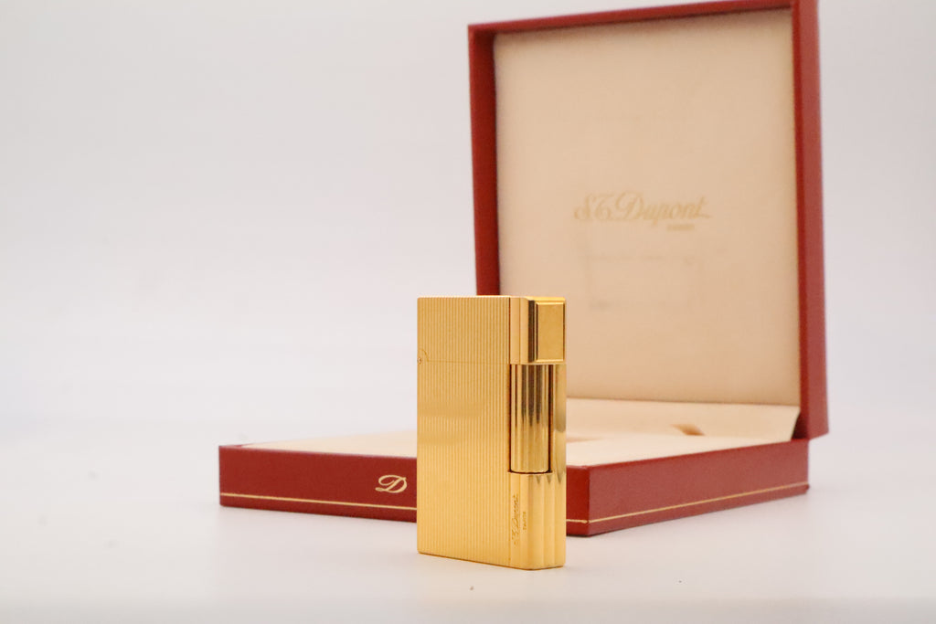 S.T. Dupont Gatsby gold lighter, new old stock condition, with original box