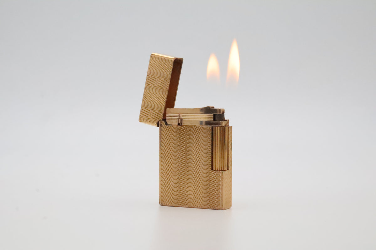 S.T. Dupont Ligne 2 Petit Modele small gold wavy pattern lighter with dual flame